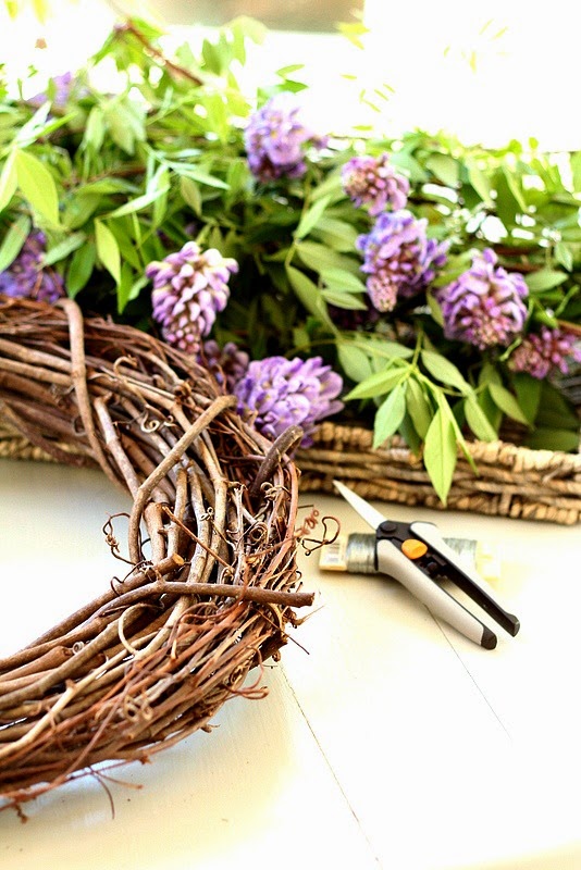 wisteria wreath with pruning shears and wire