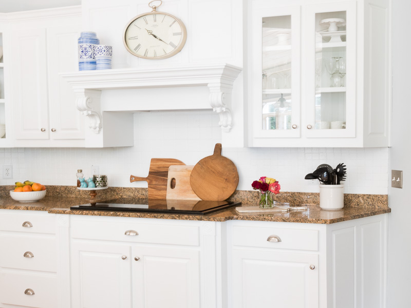 white cabinets, white tile backsplash