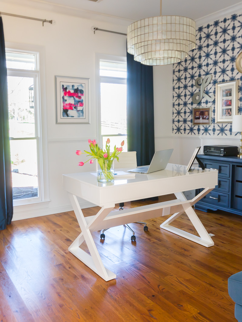 home office with white desk and white chair