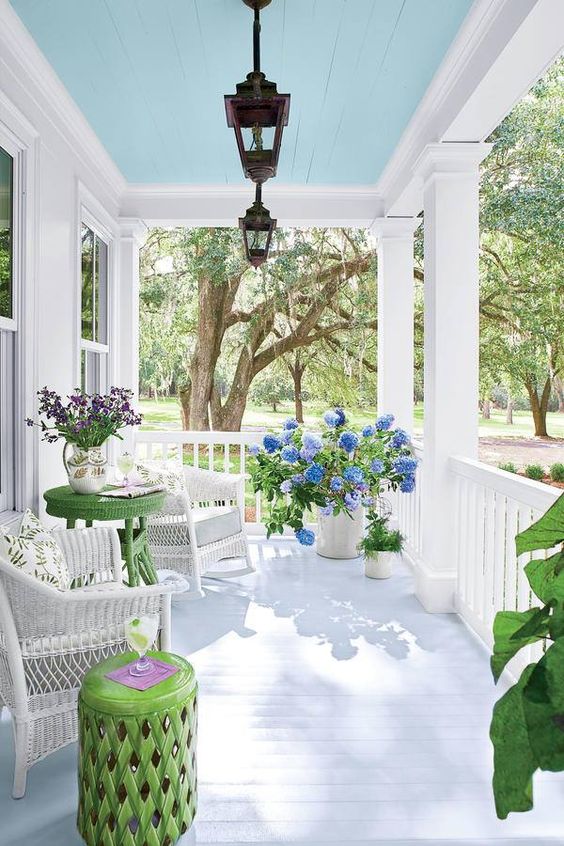 beautiful front porch with blue ceiling