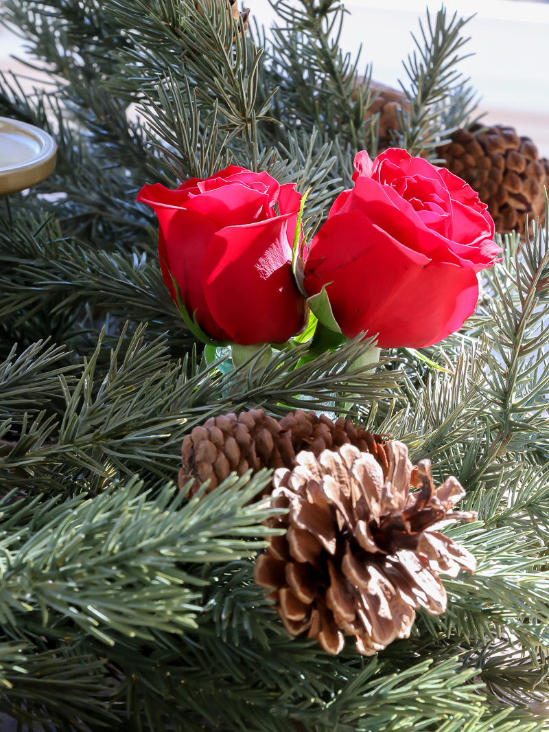 Create a festive holiday arrangement using grocery store flowers