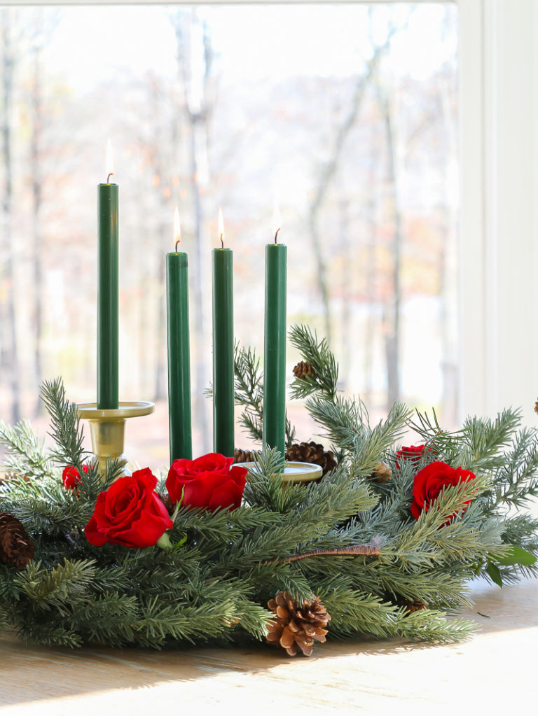 Create a festive holiday arrangement using grocery store flowers