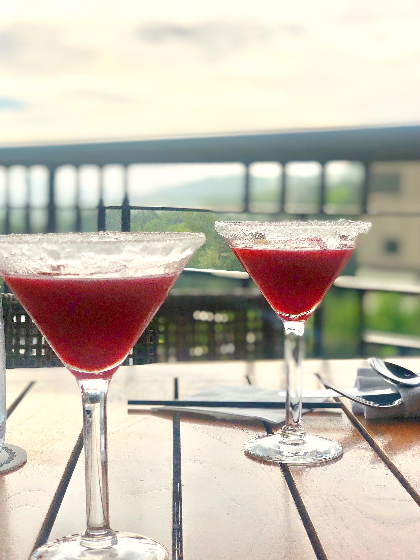 two cocktails on a table