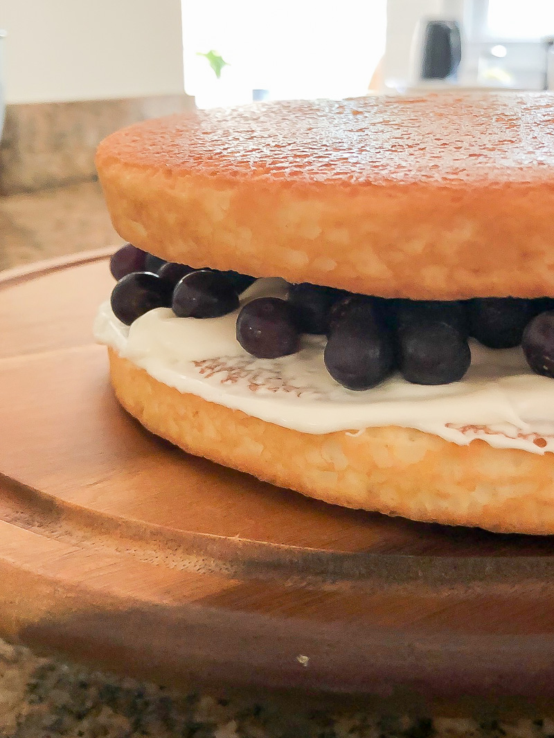 Vanilla layered cake with fresh blueberries