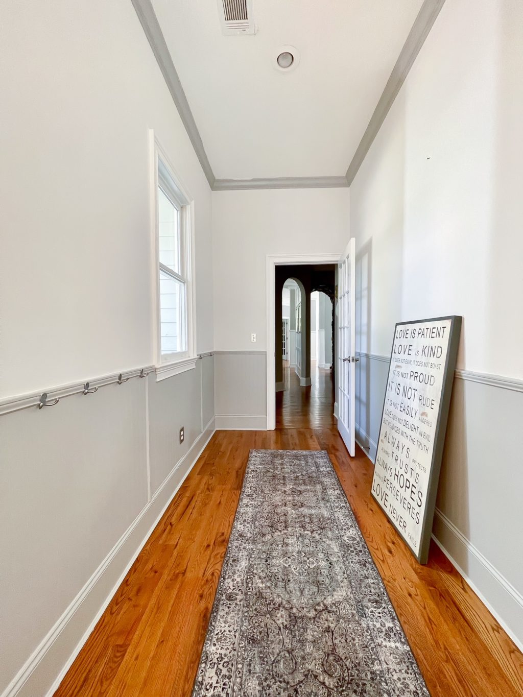 hallway with white and gray walls