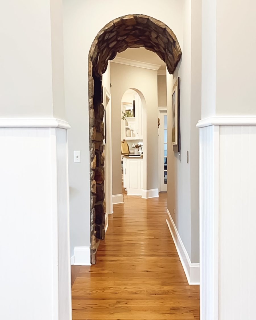 Hallway with stone arch.