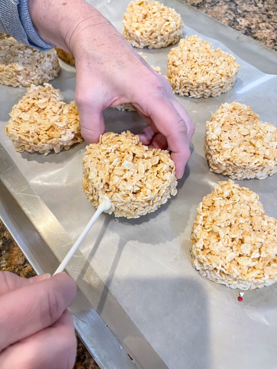 putting stick in a rice krispie treat