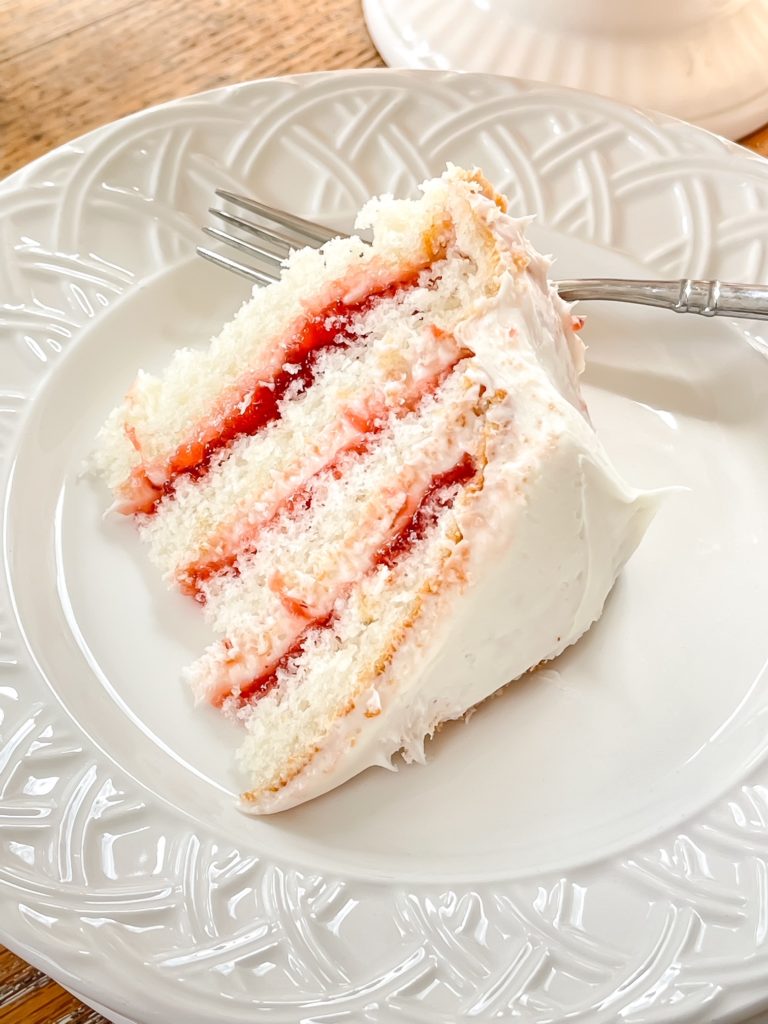 White cake with strawberry preserves