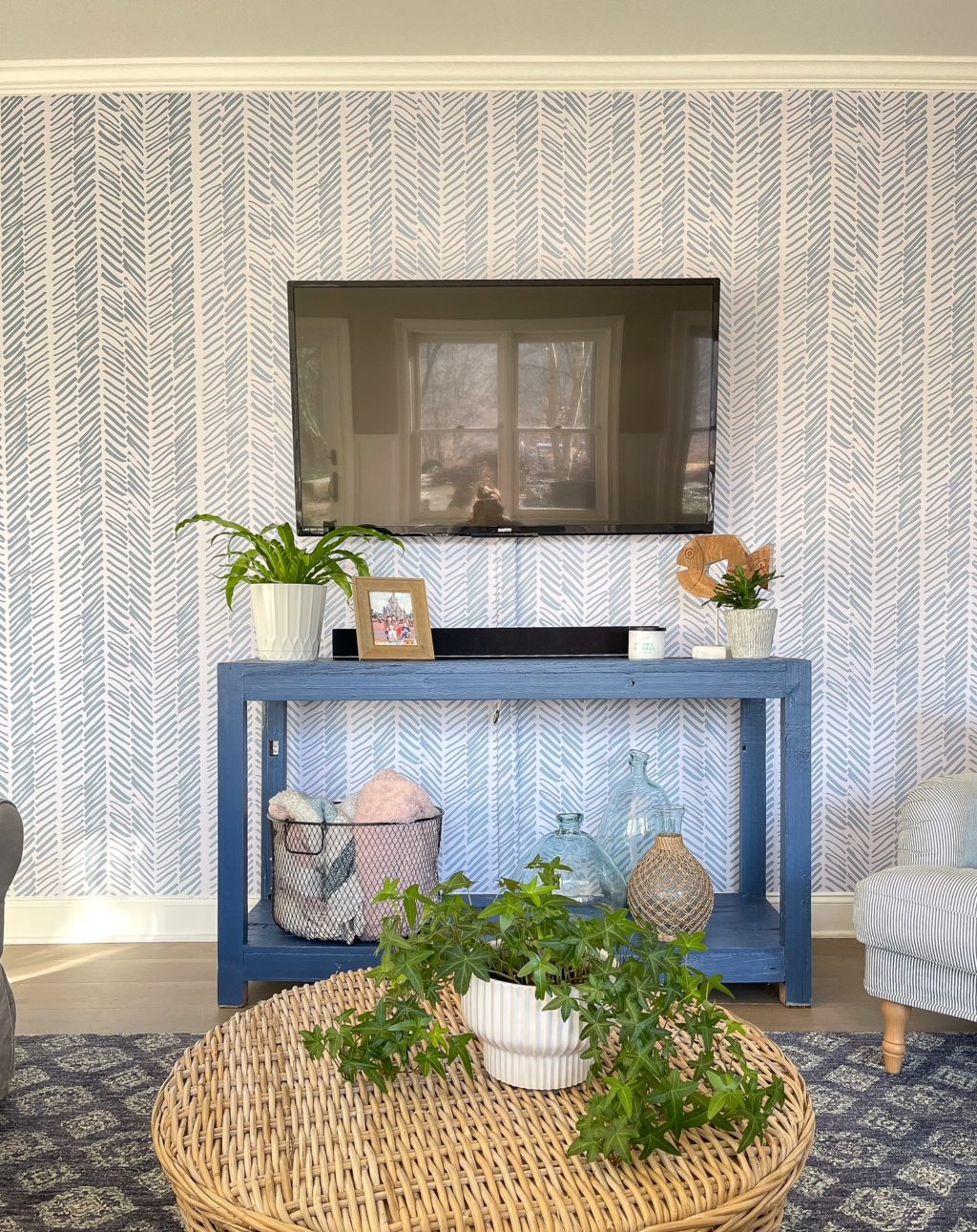view of blue and white wallpaper wall