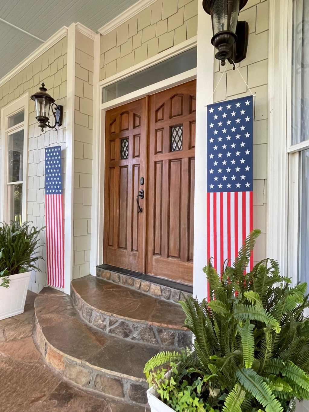 front doors with red, white and blue banners on the side
