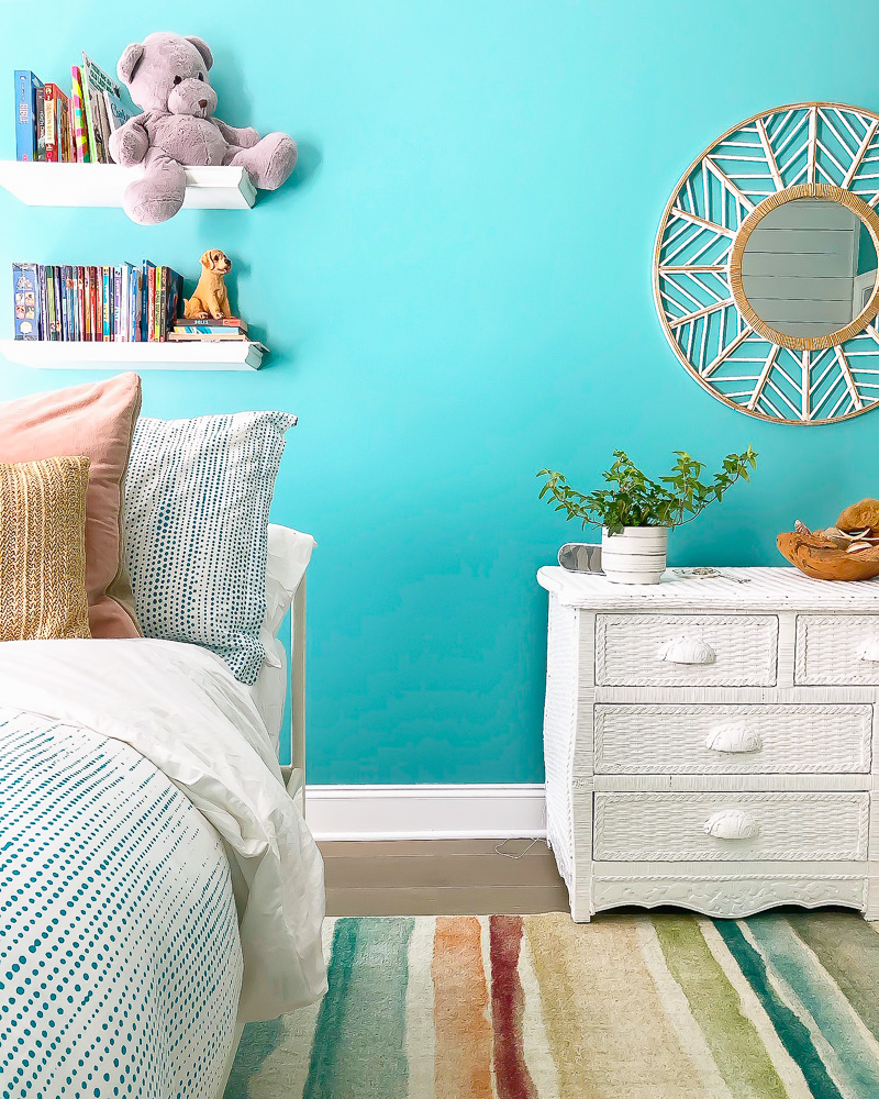 white rattan dresser against bali bliss walls from Sherwin Williams.