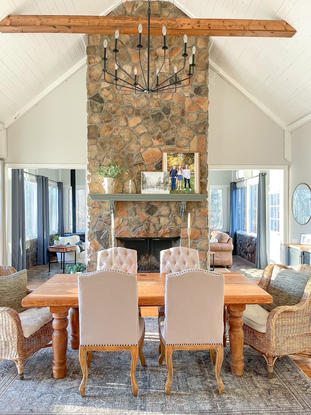 dining room with stacked stone fireplace