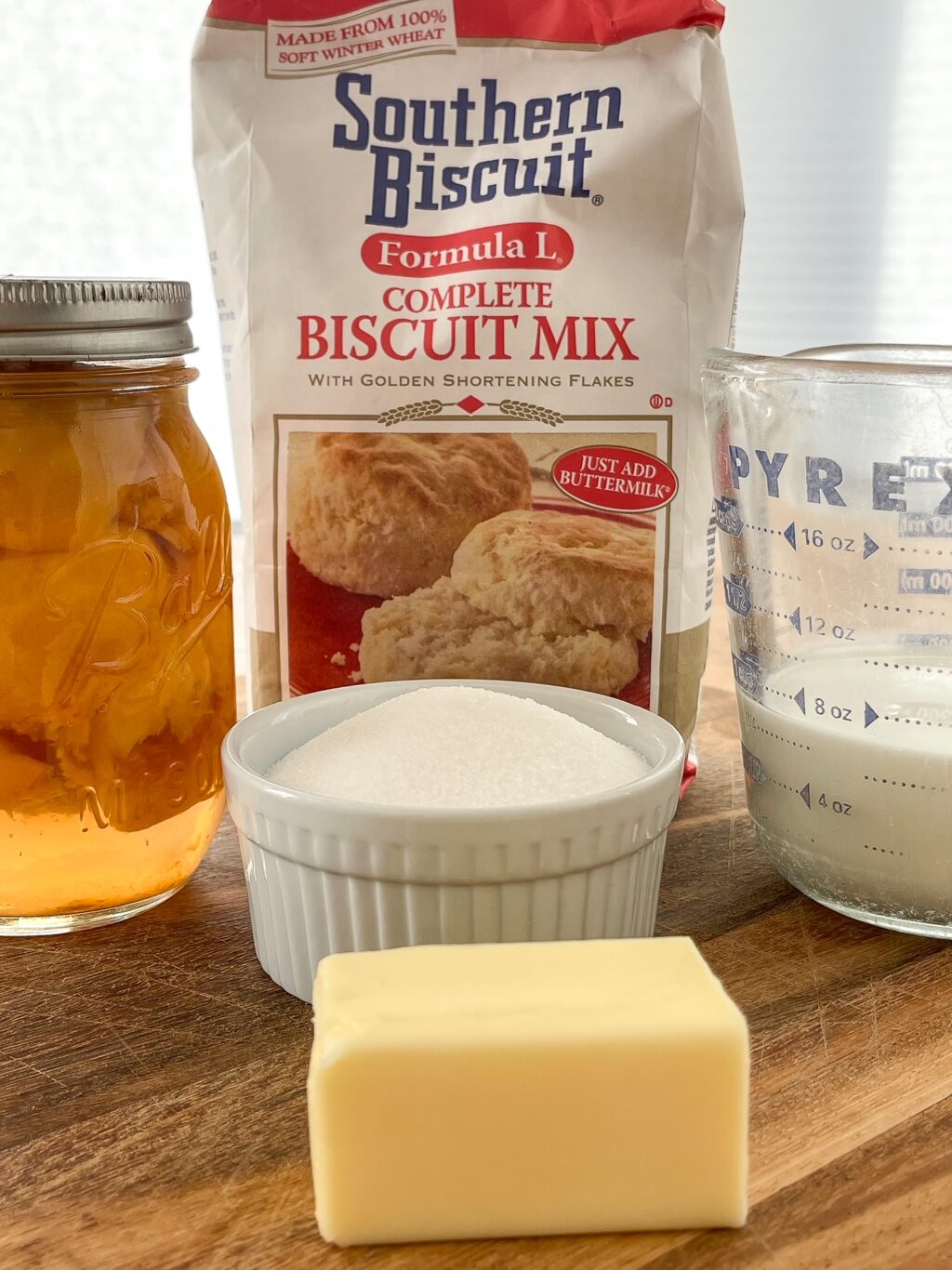 ingredients needed for peach cobbler including southern biscuit mix