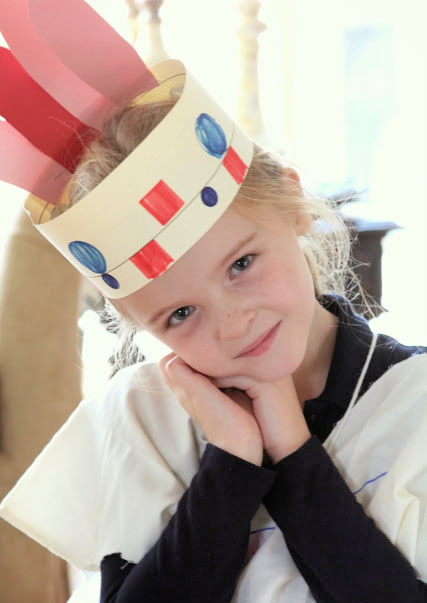 Little girl with headband at Thanksgiving time.