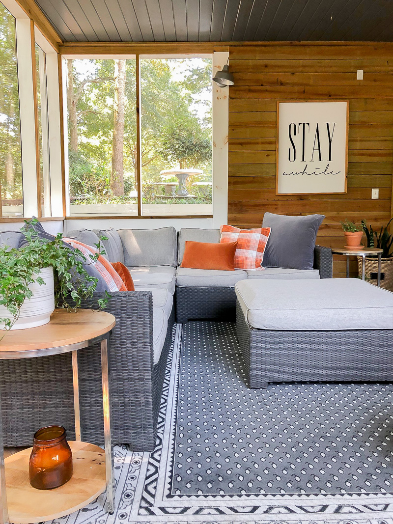 outdoor porch area with gray and orange accents