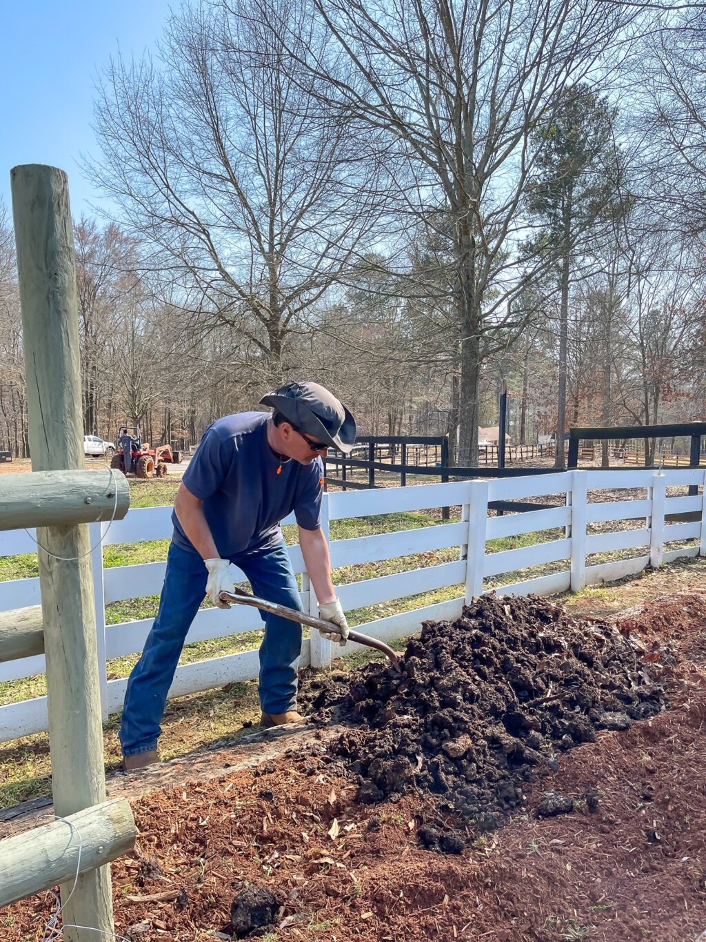 man working the garden with shovel