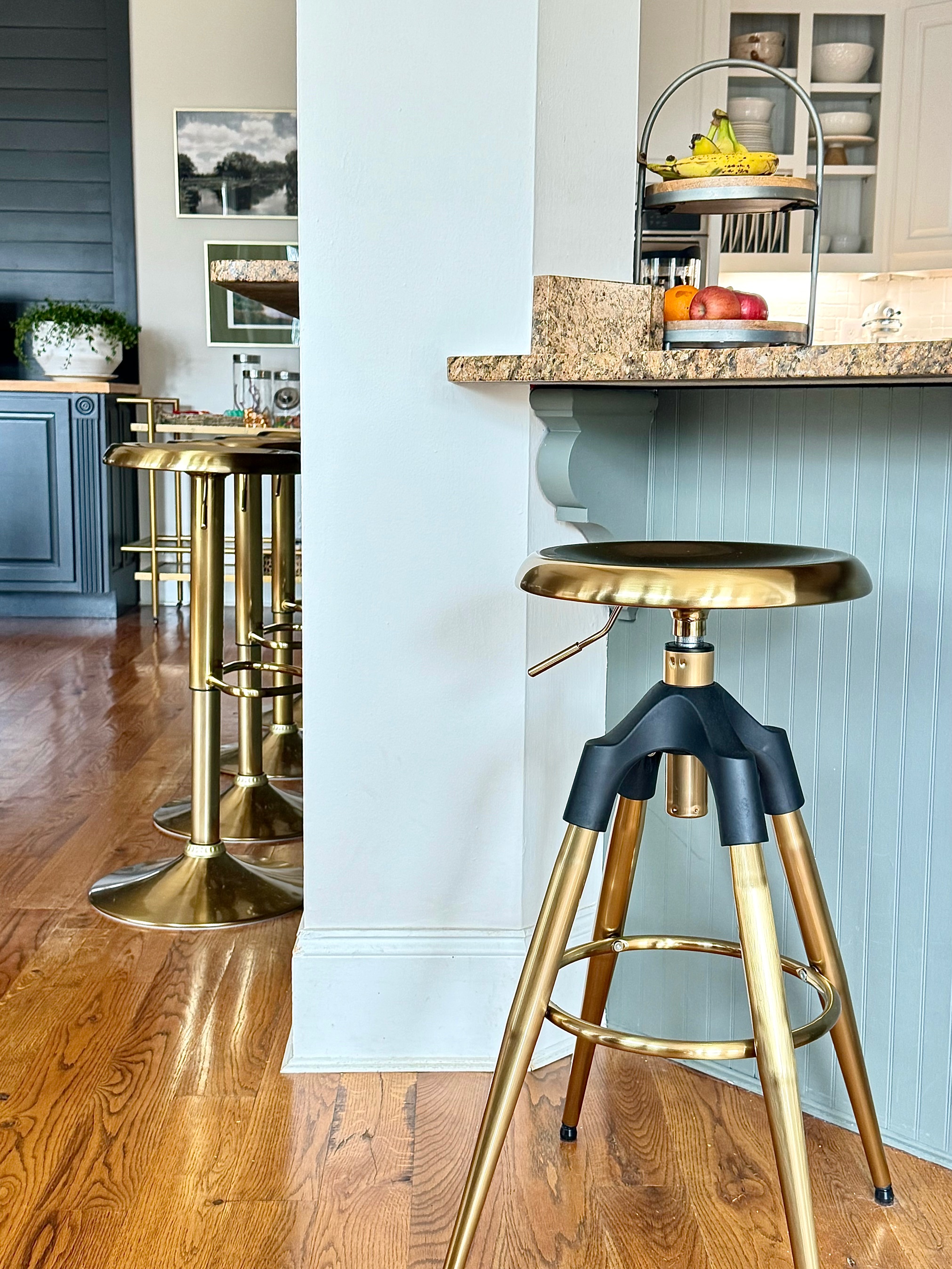 brass counter stool with black accents