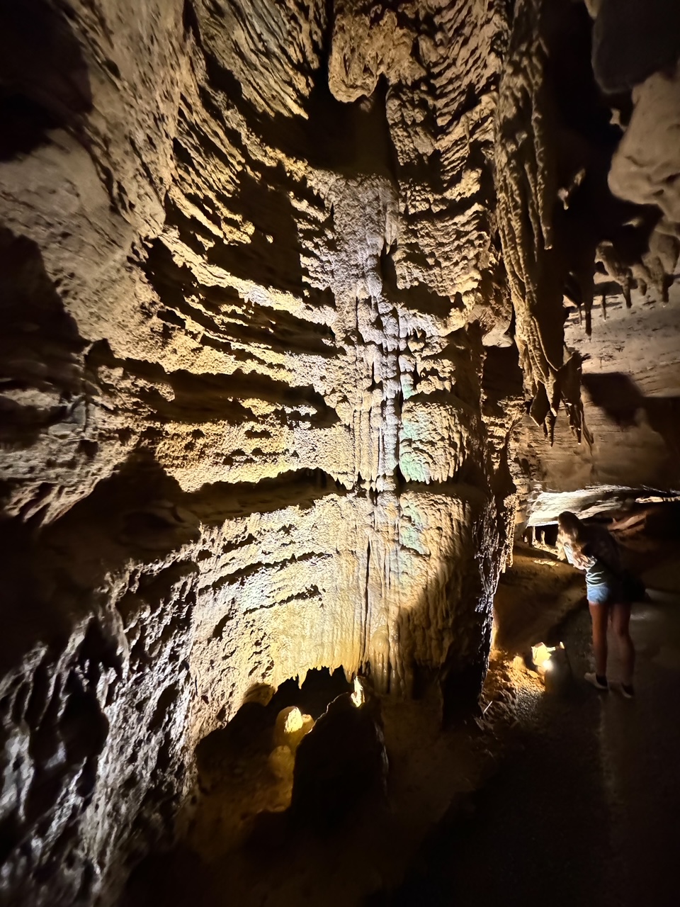 girl exploring the cave at the forbidden caverns