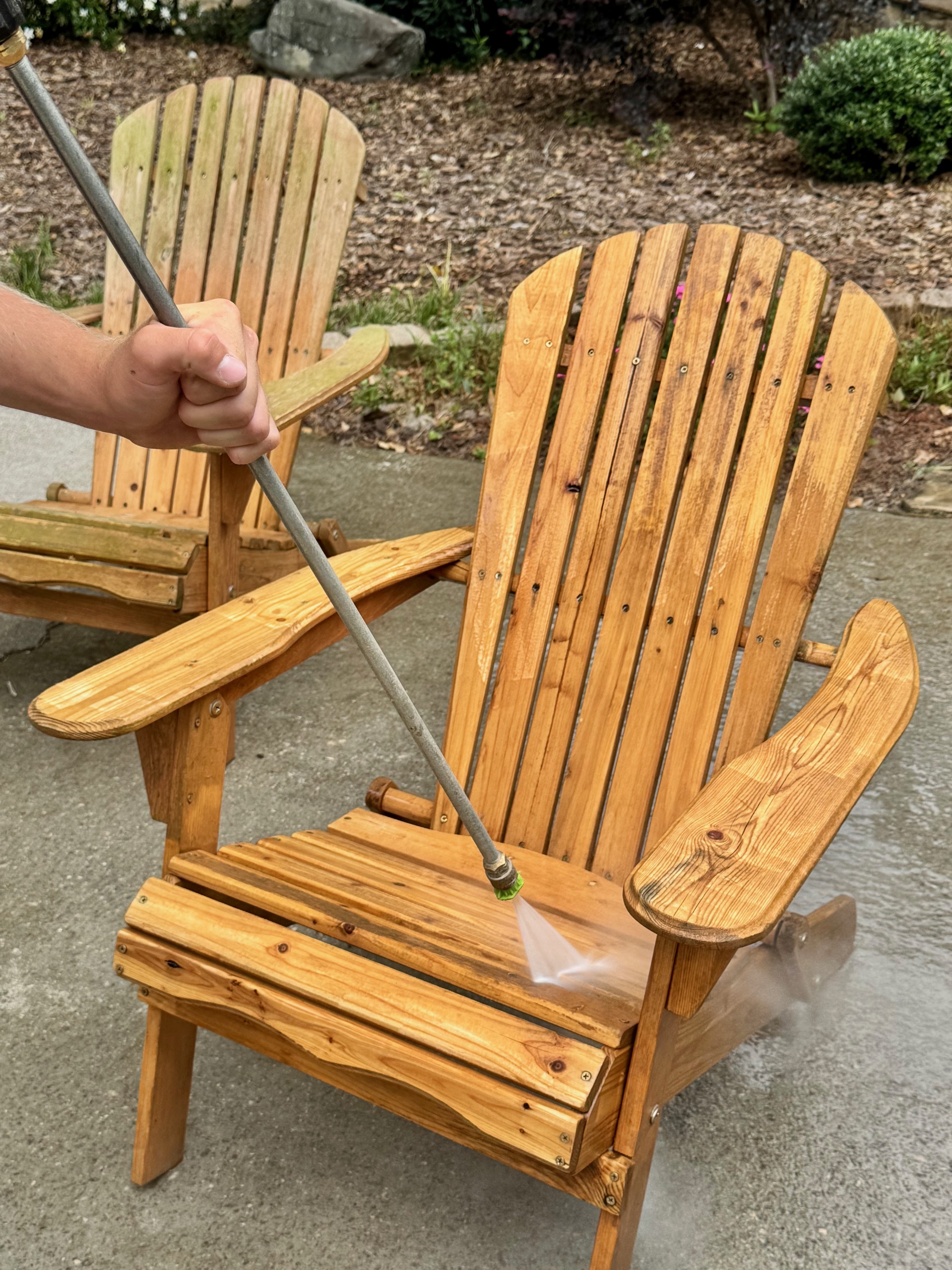 pressure washing adirondack chairs in weekend hangout at duke manor farm