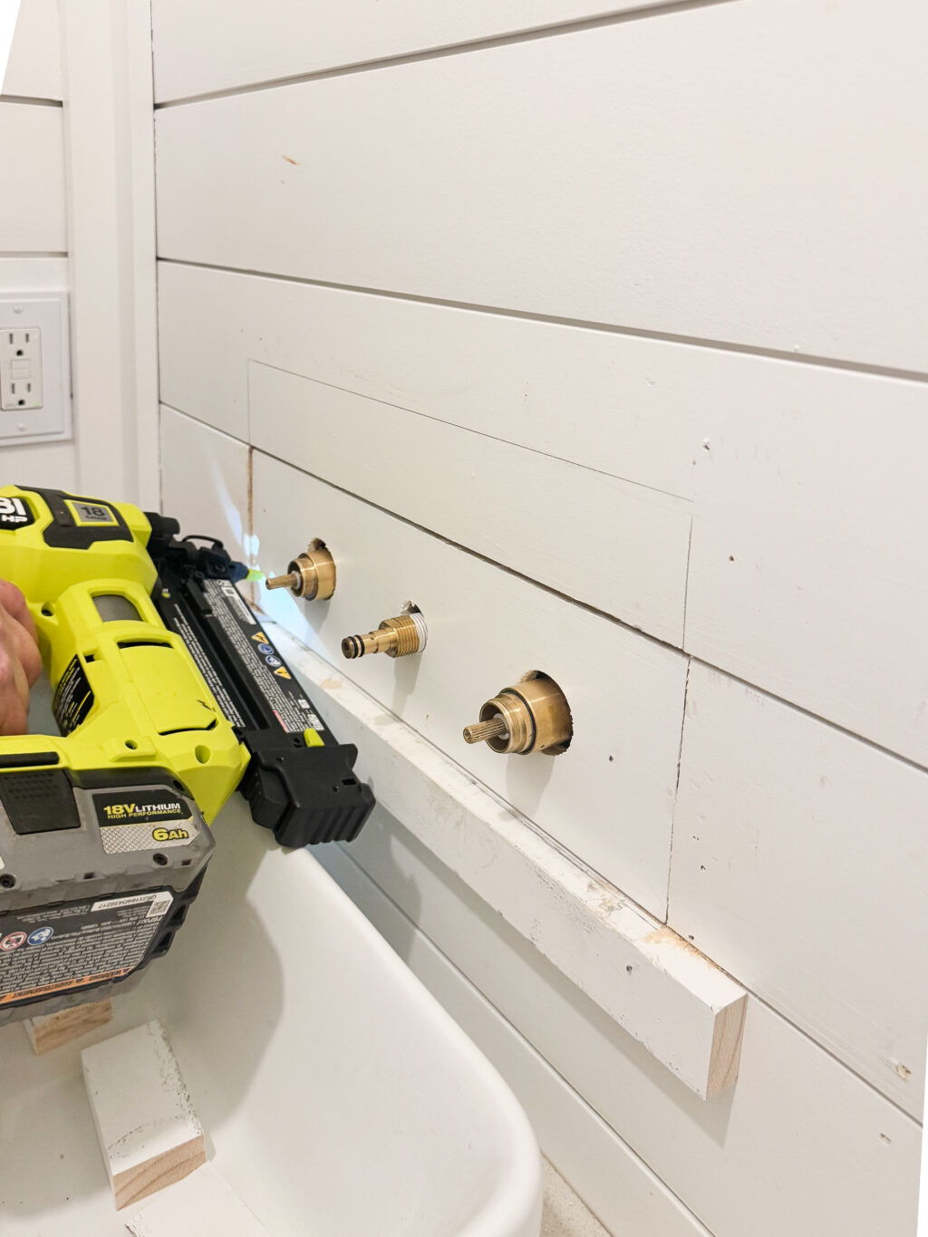 How to Build a Hidden Faux Panel on Shiplap Walls to Access Faucet Plumbing
