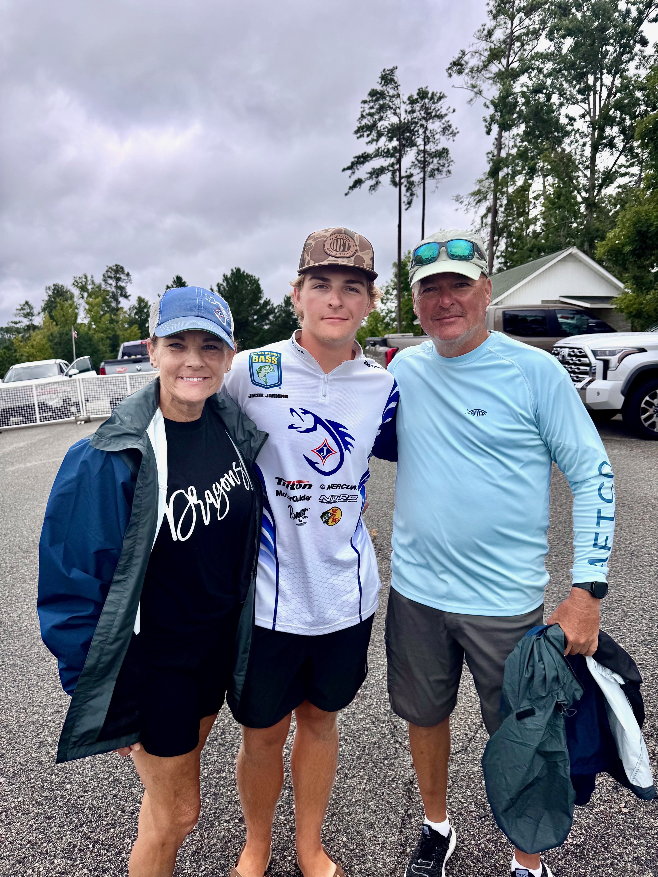 parents with angler at national fishing tournament