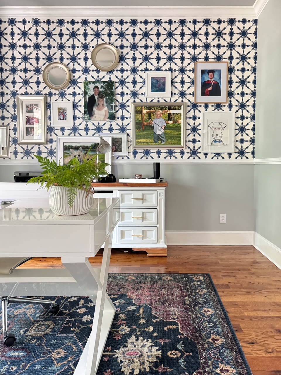 gallery wall on patterned wall paper