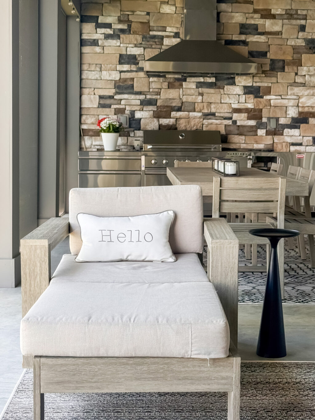 Hello pillow on chair in outdoor retreat area