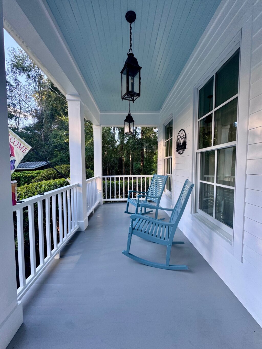refreshed front porch with blue rockers