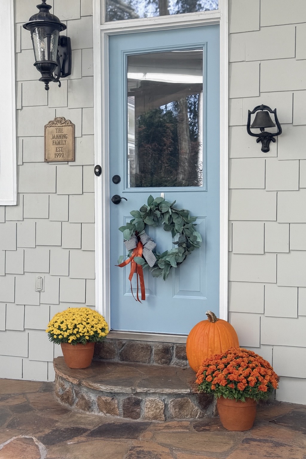 Blue by you door with pumpkins and mums at Duke Manor Farm