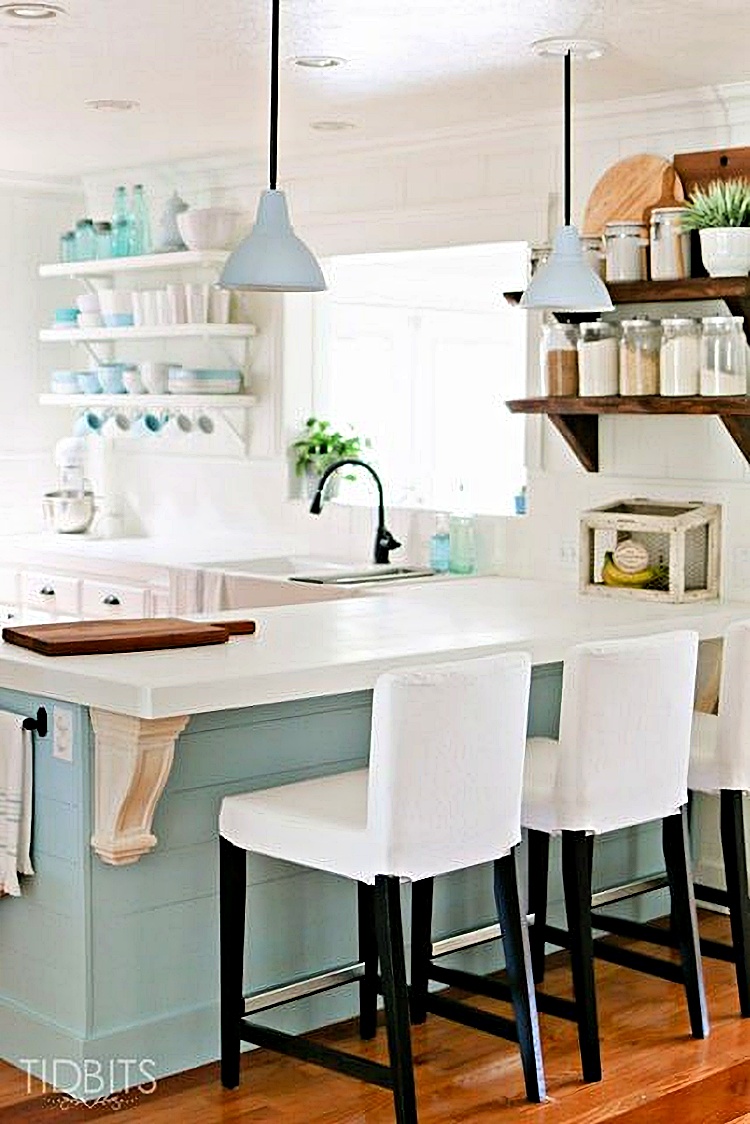 kitchen with white counters and green cabinets