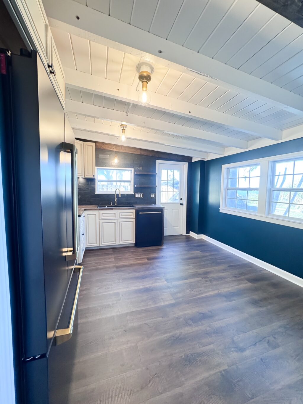 dark cottage kitchen with butcher block countertops