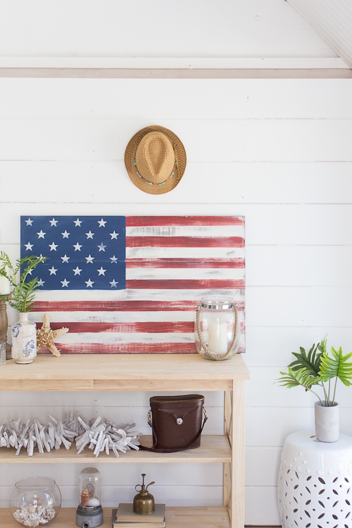 DIY rustic American flag on farmhouse porch