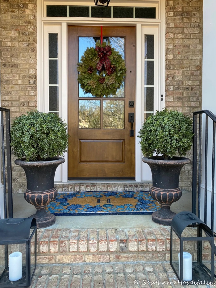 Faux boxwood topiaries in urns from Southern Hospitality