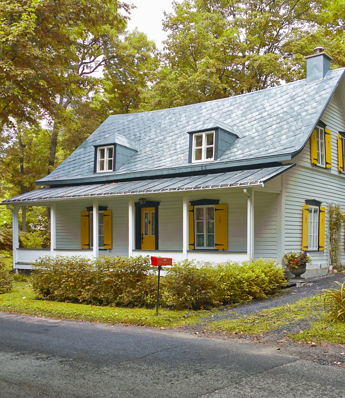 Charming quaint cottage with classic cottage garden and welcoming front porch