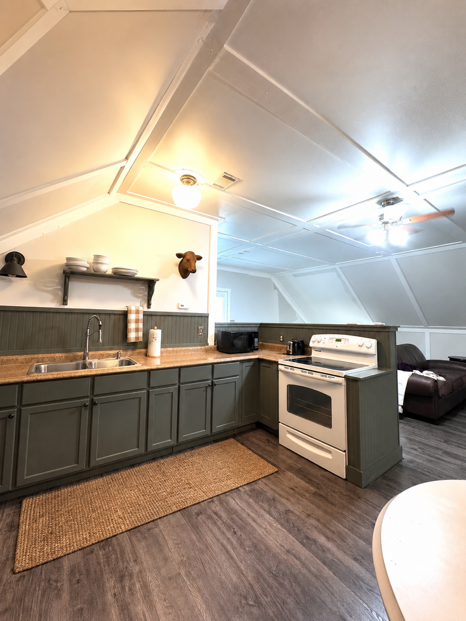 Farmhouse guest house kitchen with jute runner and buffalo check accents