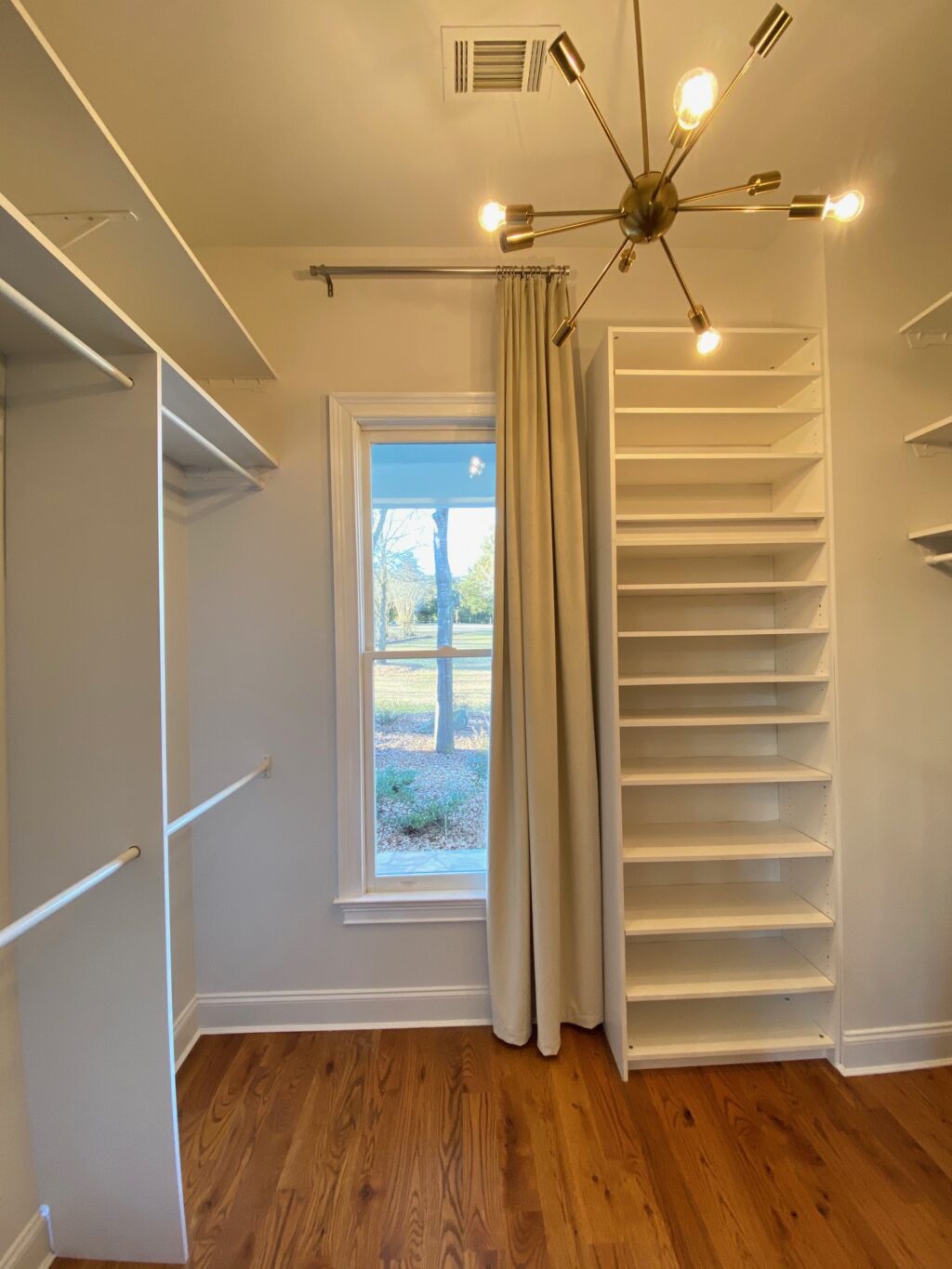 Closet makeover with new lighting and curtains