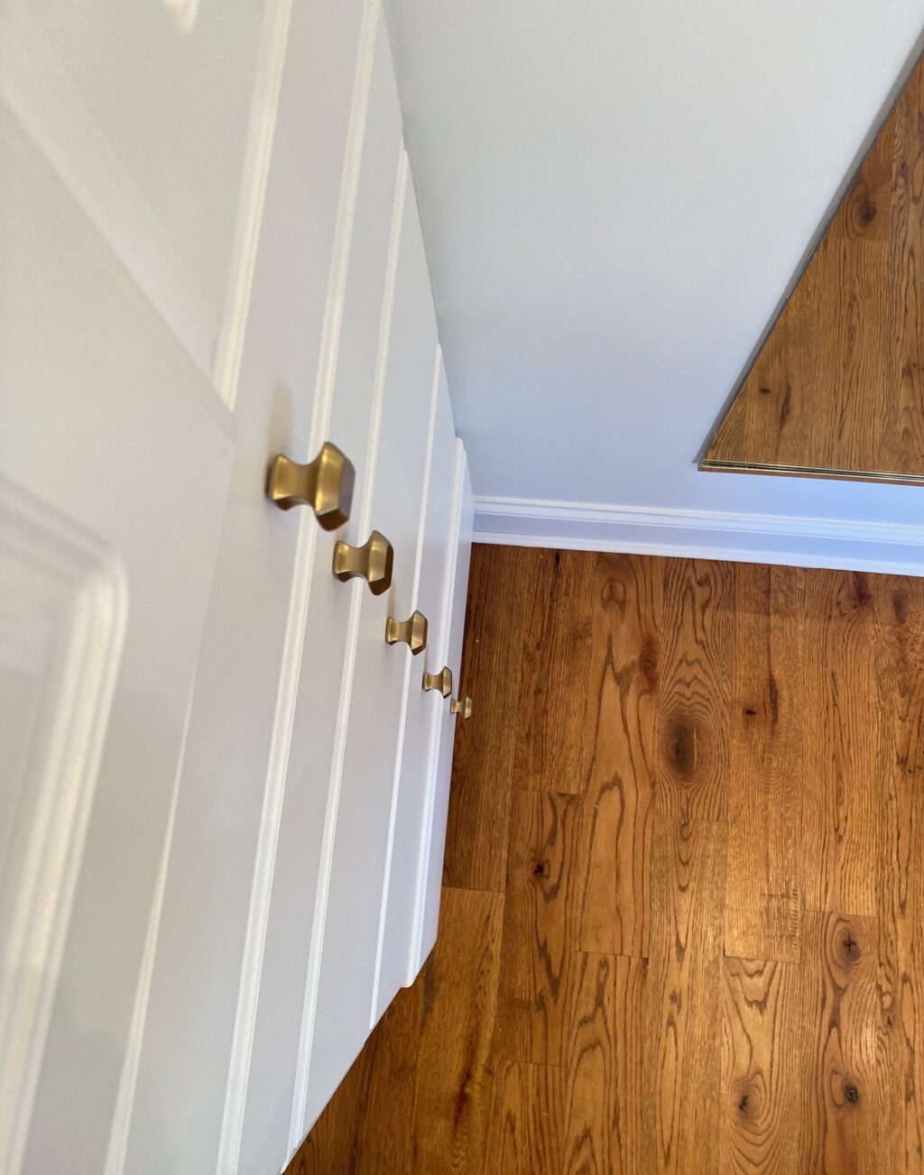 new knobs on master closet cabinets