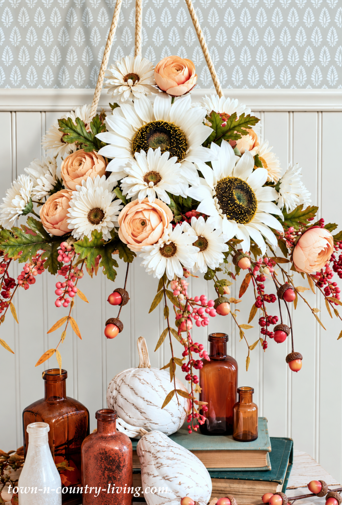 Fall decorating ideas with sunflowers with vintage bottles